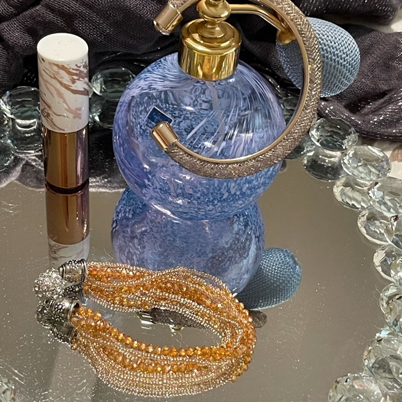 Two bracelets. Gold-tone bangle w/glass beads, gold-beads w/silver-tone clasp. - Picture 2 of 4